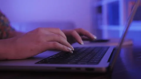Close up of freelancers developer hands typing program code on laptop keyboard Stock Footage 252262471