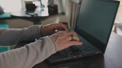 Close up of freelancer's developer hands typing program code on laptop keyboard Stock Footage 269993503