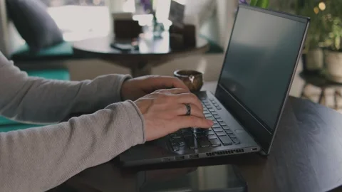 Close up of freelancer's developer hands typing program code on laptop keyboard Stock Footage 269993912
