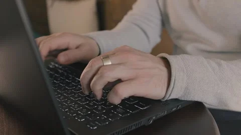 Close up of freelancer's developer hands typing program code on laptop keyboard Stock Footage 269994799