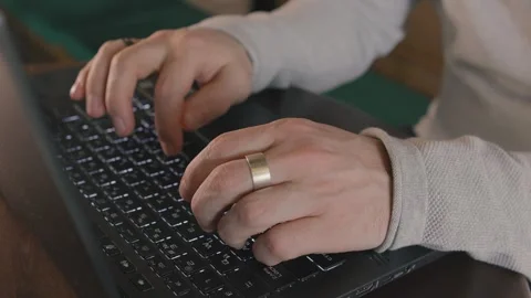 Close up of freelancer's developer hands typing program code on laptop keyboard Stock Footage 269995228