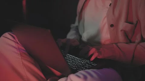 Close up of freelancer's developer hands typing program code on laptop keyboard Stock Footage 271680944