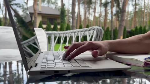 Close up of freelancer's developer hands typing program code on laptop keyboard Stock Footage 304706492