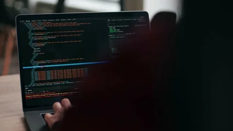 Close up of freelancer's hands typing code on laptop keyboard. Camera slides Stock Footage 220072984