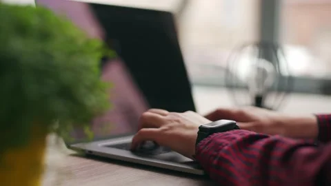 Close up of freelancer's hands typing code on laptop keyboard. Camera slides Stock Footage 221605511