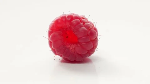 A Close-Up Of Fresh And Tasty Raspberry Rotating. Isolated, On White Background. 動画素材 237606367