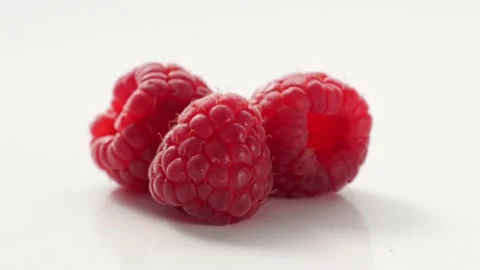 A Close-Up Of Fresh And Tasty Raspberry Rotating. Isolated, On White Background. 動画素材 237606369