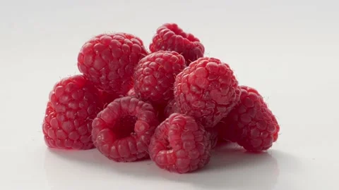 A Close-Up Of Fresh And Tasty Raspberry Rotating. Isolated, On White Background. 動画素材 237606441