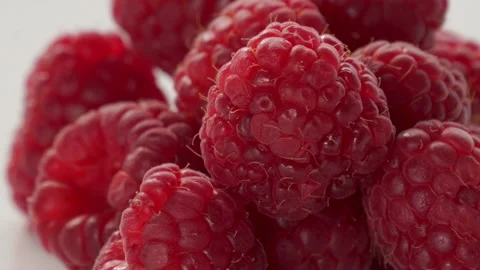 A Close-Up Of Fresh And Tasty Raspberry Rotating. Isolated, On White Background. 動画素材 237606556