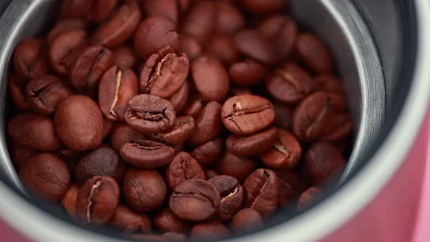 Close-Up of Fresh Aromatic Coffee Beans in a Metal Grinder Video stock 294040354