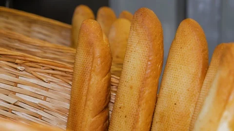 Close-up of fresh baguettes in basket Stock Footage 108633669
