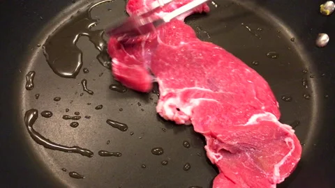 Close up, fresh beef fillet being grilled with oil Stock Footage 140923674