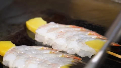 Close-up of Fresh Botan Ebi (Spot Prawn) Skewers Sizzling on a Hot Griddle Stock Footage 337440650