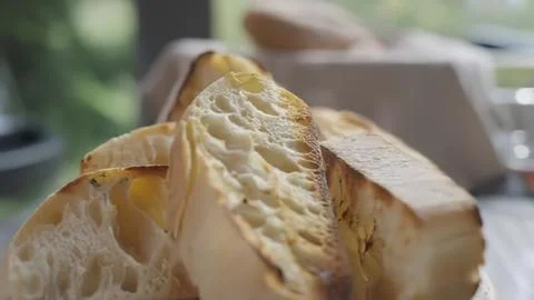 Close-up of fresh bread loaf slices on a table 스톡 사진