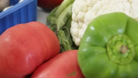Close-up of fresh bright vegetables. Tomatoes, peppers, mushrooms and cabbage Stock Footage 315028684