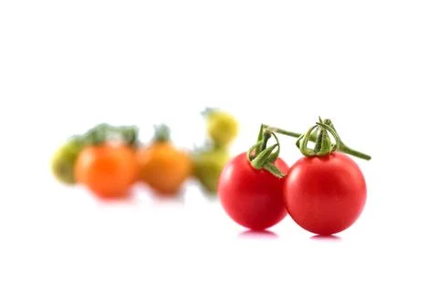 Close up of fresh cherry tomato isolated on white background. Foto stock