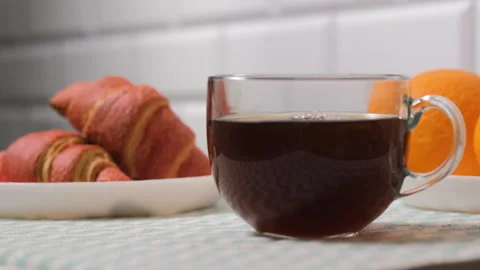 Close-up of fresh coffee pouring into cup Vídeo Stock 321954452