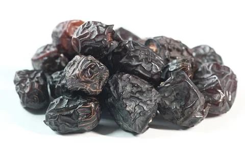 Close up of fresh date fruit on white background Stock Photos