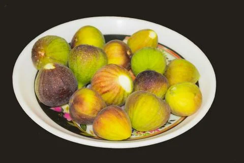 Close up of fresh fig fruit isolated Stock Photos