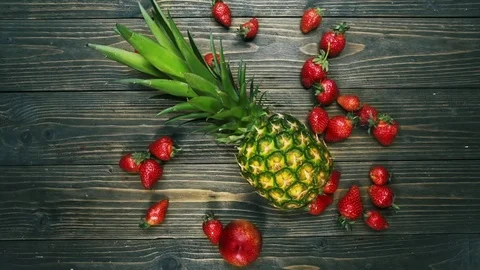 Close up of fresh fruits. Two hands, men and women put on the table different Stock Footage 78655662
