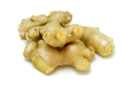 Close up fresh ginger isolated on white background. Stock Photos