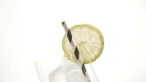 Close Up Of Fresh Glass With Ice Cubes On bright White Screen Background Stock Footage 244448966