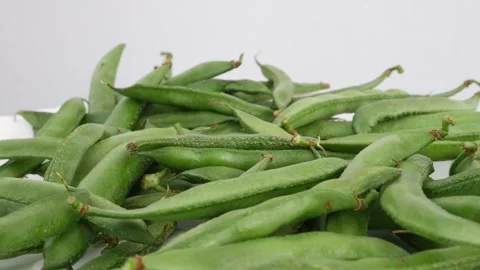 Close-up of Fresh Green Beans on White Plate Stock Footage 303610984