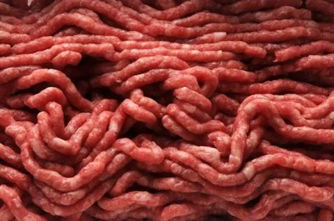 Close up on fresh ground beef background Stock Photos