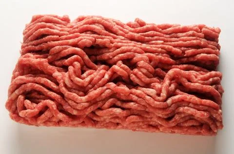 Close up on fresh ground beef background Stock Photos
