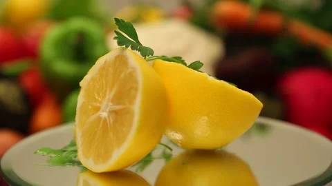 Close Up Of Fresh Halved Lemon Garnished With Parsley Stock Footage 343742976