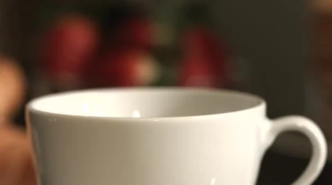 Close Up Fresh Hot Coffee Being poured Into Cup And Saucer in Kitchen Stock Footage 62453854