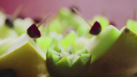 Close Up Of Fresh Kiwi And Melon And Fruits On Plate Stock Footage 304798022