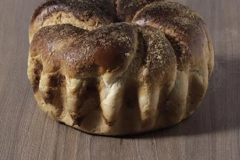 Close-up of fresh loaf of bread on the table. Stock Photos