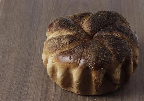 Close-up of fresh loaf of bread on the table. Stock Photos