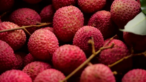 Close-up of fresh lychee. Red lychee exotic fruits shot with slide camera Video stock 131691333