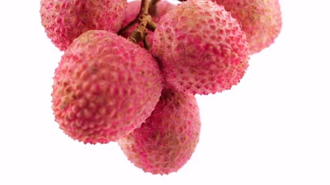 Close-up of fresh lychee rotating on white background Stock-Footage 130838952