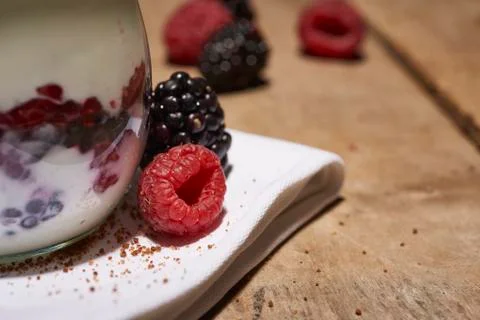Close up of fresh made dessert with brambles and raspberries Stock Photos