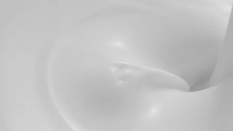 Close-up of Fresh Milkshake Cream Pouring in High Speed at 1500 fps Stock Footage