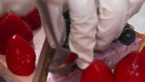 Close-up of Fresh Mixed Berry Cheesecake Pie with Strawberries and Blueberries Stock Footage 337751244