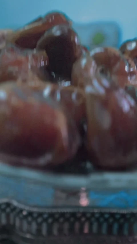 “Close-Up of Fresh Moroccan Dates” Video stock 303965613