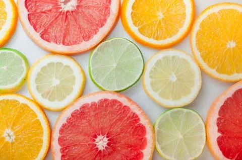 Close up of fresh orange, grapefruit, lime and lemon slices Stock Photos