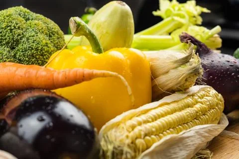 Close-up of fresh organic vegetables on rustic wood table Stock Photos