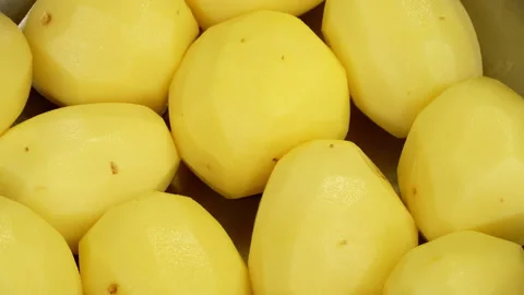 Close Up Fresh Peeled Raw Yellow Potatoes Video stock 343592946