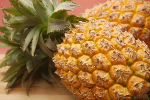 Close up of fresh Pineapple in bowl on table Stock Photos