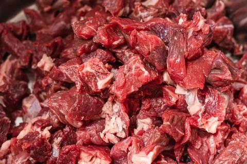 Close-up of fresh raw beef chunks, ready for cooking 스톡 사진