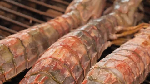 Close-up of Fresh Raw Mantis Shrimps Grilling on a BBQ Grill Stock Footage 344222320