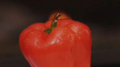 Close up fresh red peppers on white background scattering on table ingredient Stock Footage 100306896