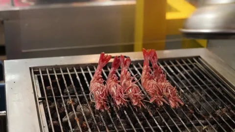 Close-Up of Fresh Red Prawns Grilling on a Charcoal BBQ Grill Stock-Footage 344230855