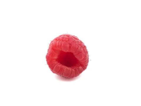 Close-up of a fresh red raspberry on white background Stock Photos