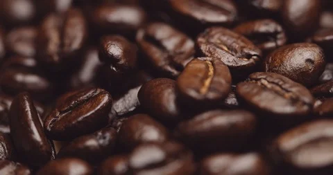 Close-up of fresh roasted dark brown espresso coffee beans Stock Footage 121062495